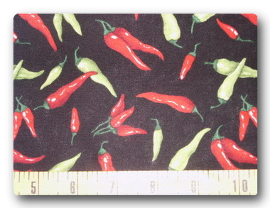 Green and Red Chilis on Black-